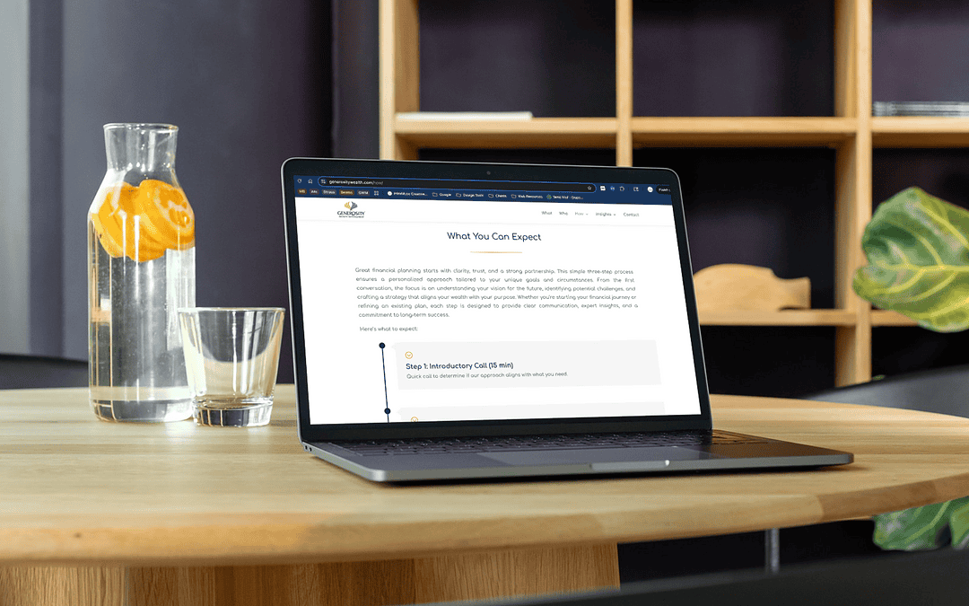Laptop on modern desk showing a professional service website page with step-by-step client process.